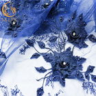 لباس عروس آبی تیره پارچه توری تزیین بدلیجات عرض 55 اینچ