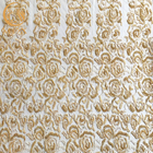 پارچه توری دست‌ساز با منجوق دوزی طلا برای لباس