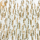 جنس نایلون پارچه توری گل سه بعدی طلا با عرض 135 سانتی متر